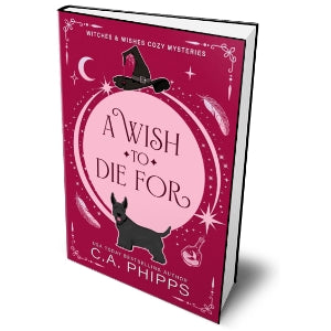 Book cover of 'A Wish to Die For' by C.A. Phipps with a pink circular design and witch's hat.